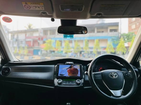 Toyota Axio Hybrid 2015 view 3